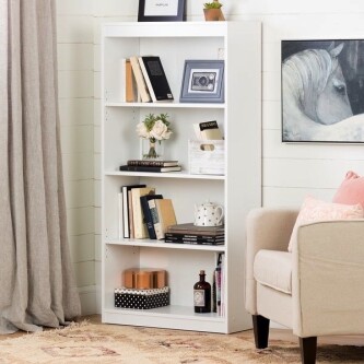 FREE STANDING BOOK SHELF.